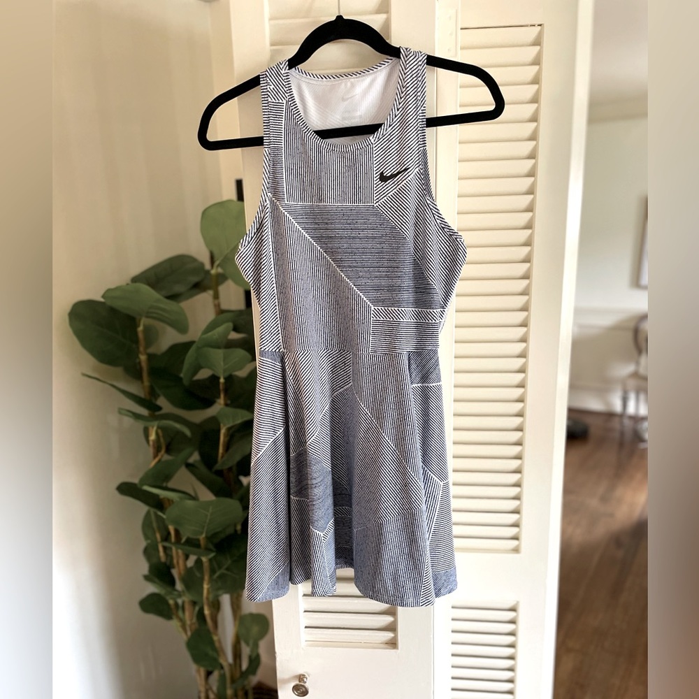 Nike Dri Fit Tennis Dress in asymmetrical navy and white stripes. Size small.